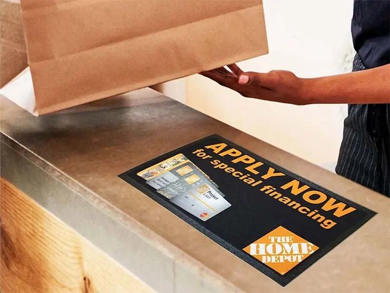 Custom counter mat used for retail brand promotion
